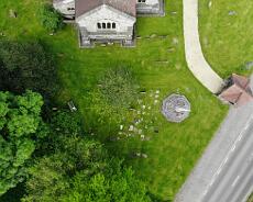 34C7329A80F2D2B6AF0834DA9283213A Aerial view of the eastern portion of Hatton Churchyard including the war memorial and cremation plaques