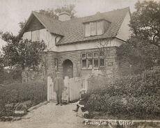 Rowington Post Office with Boyles family George Amos Boyles with his two daughters Gladys (b1914) and Leah (sitting, b1911) outside Rowington Post Office c1917