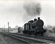 img20220128_0229 Ex LMMS Class 4F leaves Rowington Siding with a train of condemned coaches