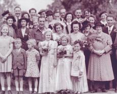 S1102N_0004 Wedding group of Gerald and Monica Holmes in 1950s