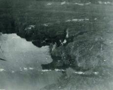 RPR05_0064 Bomb crater in the field on the corner of Queens Drive and Old Warwick Road caused by a stray from the Coventry Blitz